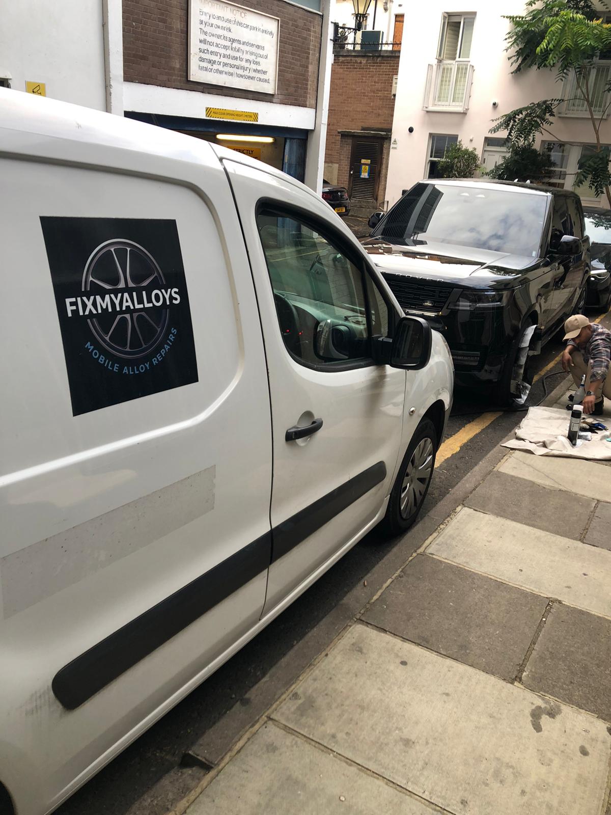 FixMyAlloys Technician Working on Car - Mobile Alloy Repair Service